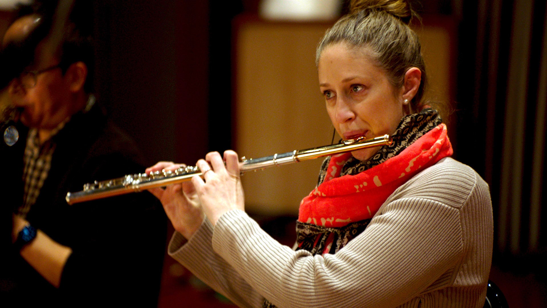 Musician playing the flute - member of the Strange New Worlds orchestra. 