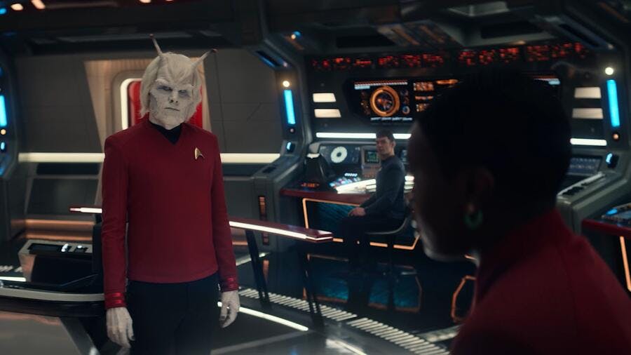 On the bridge of the Enterprise, Hemmer looks over with a slight head tilt towards Uhura in 'Lost in Translation'