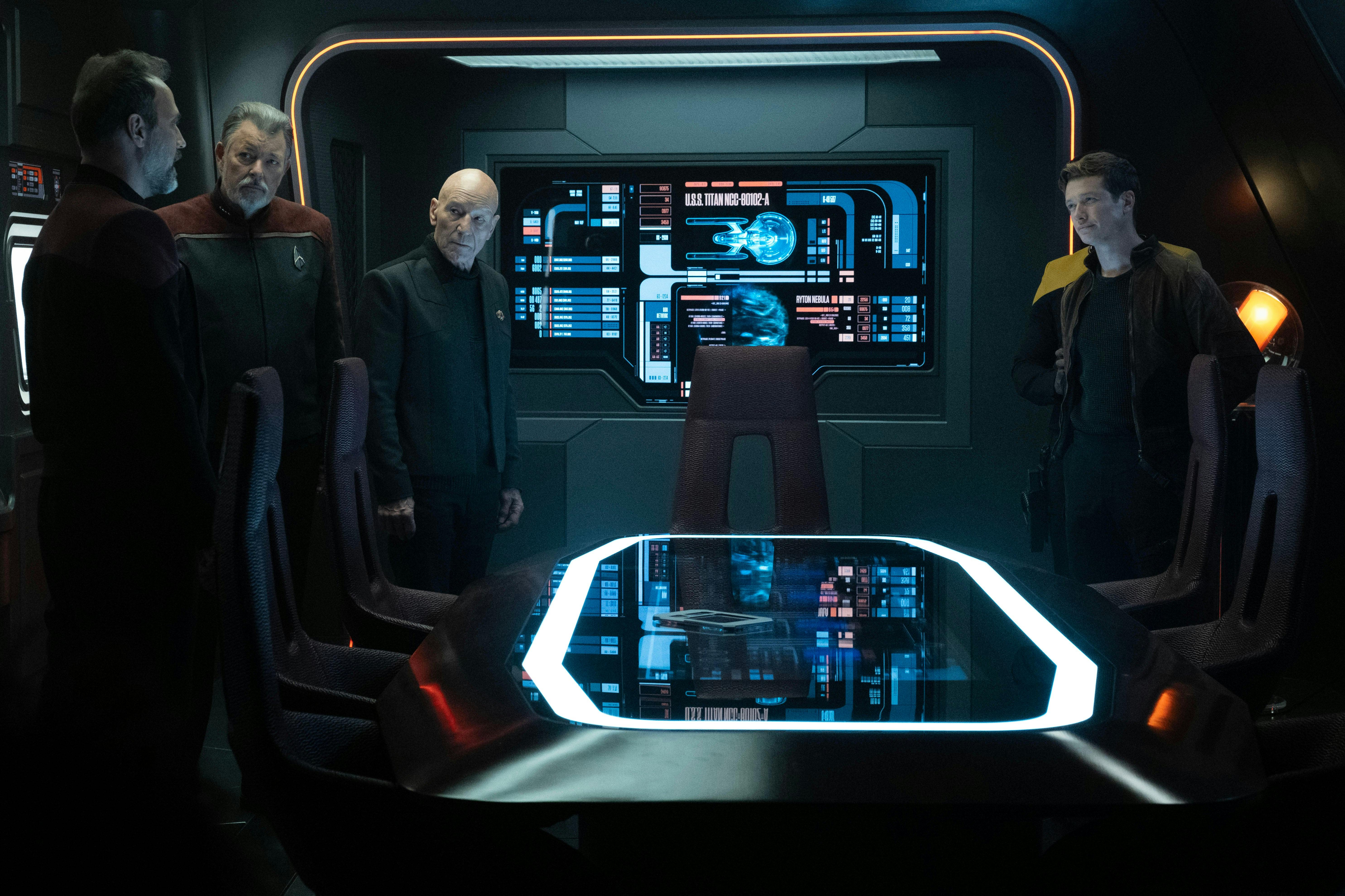 In the Titan's Observation room, Shaw, Riker, and Picard stand across the table from Jack Crusher in 'Disengage'