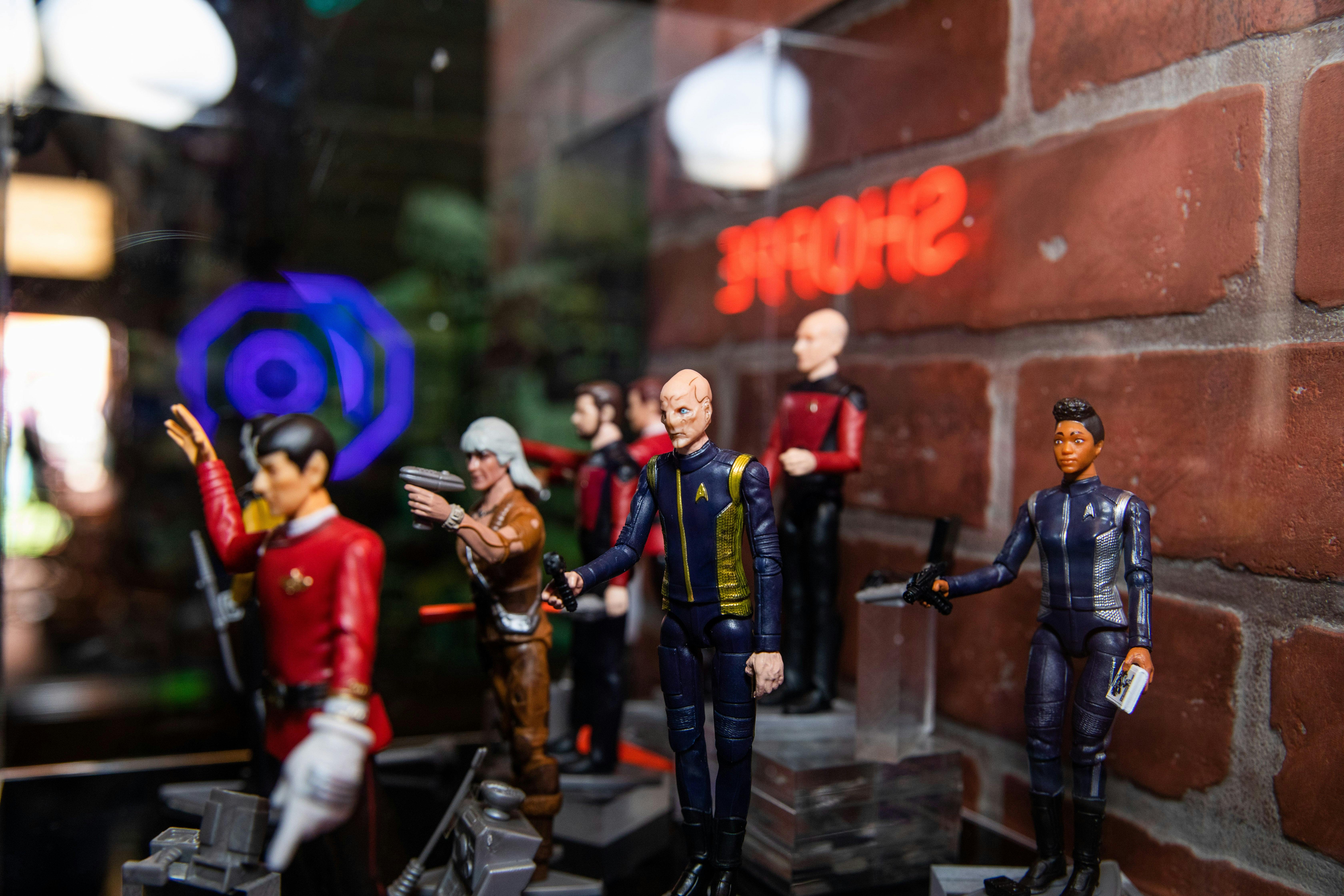 Several Star Trek action figures on display at 10-Forward.
