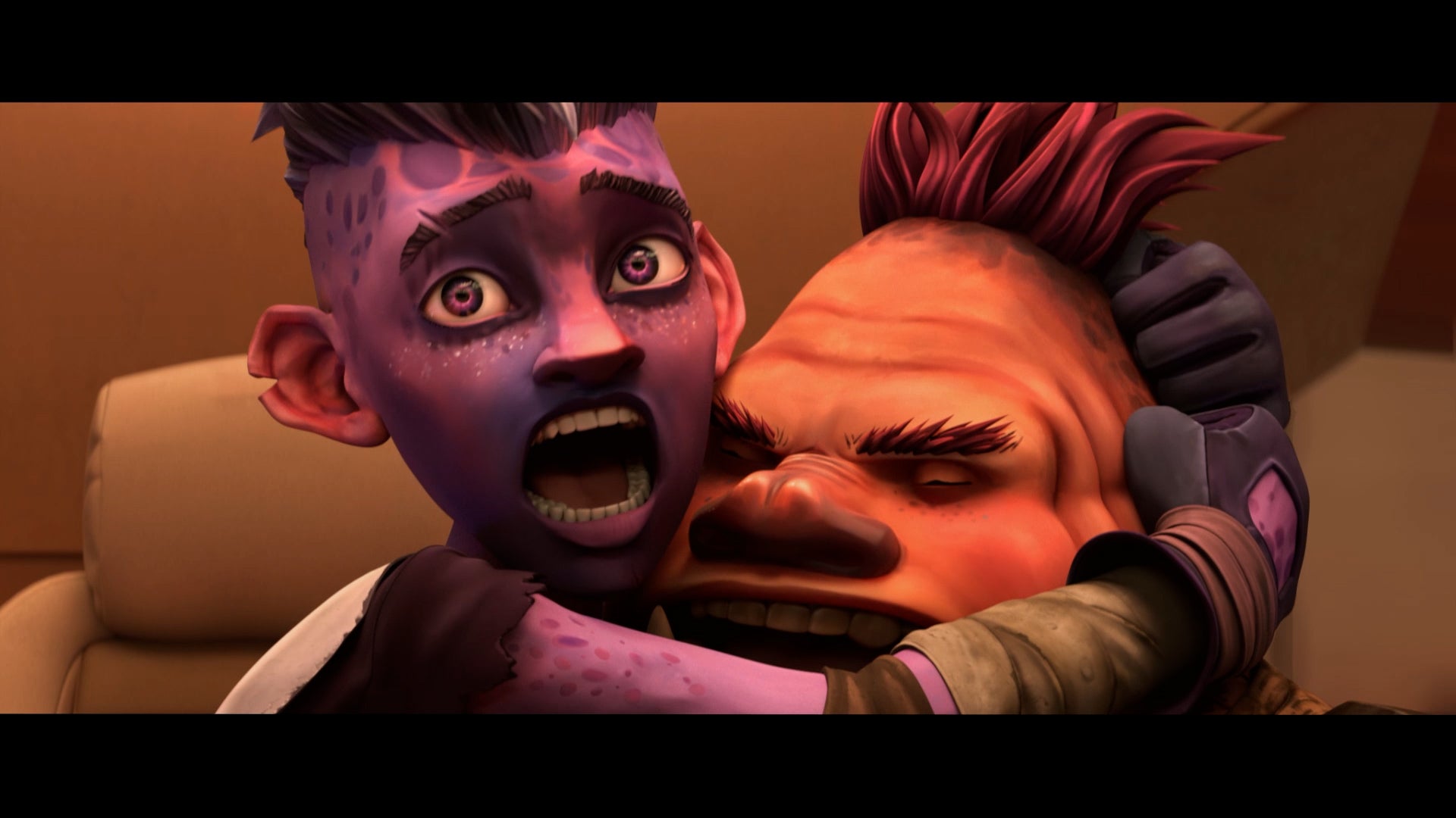 Dal and Jankom hugging each other and shouting in a still from Star Trek: Prodigy 