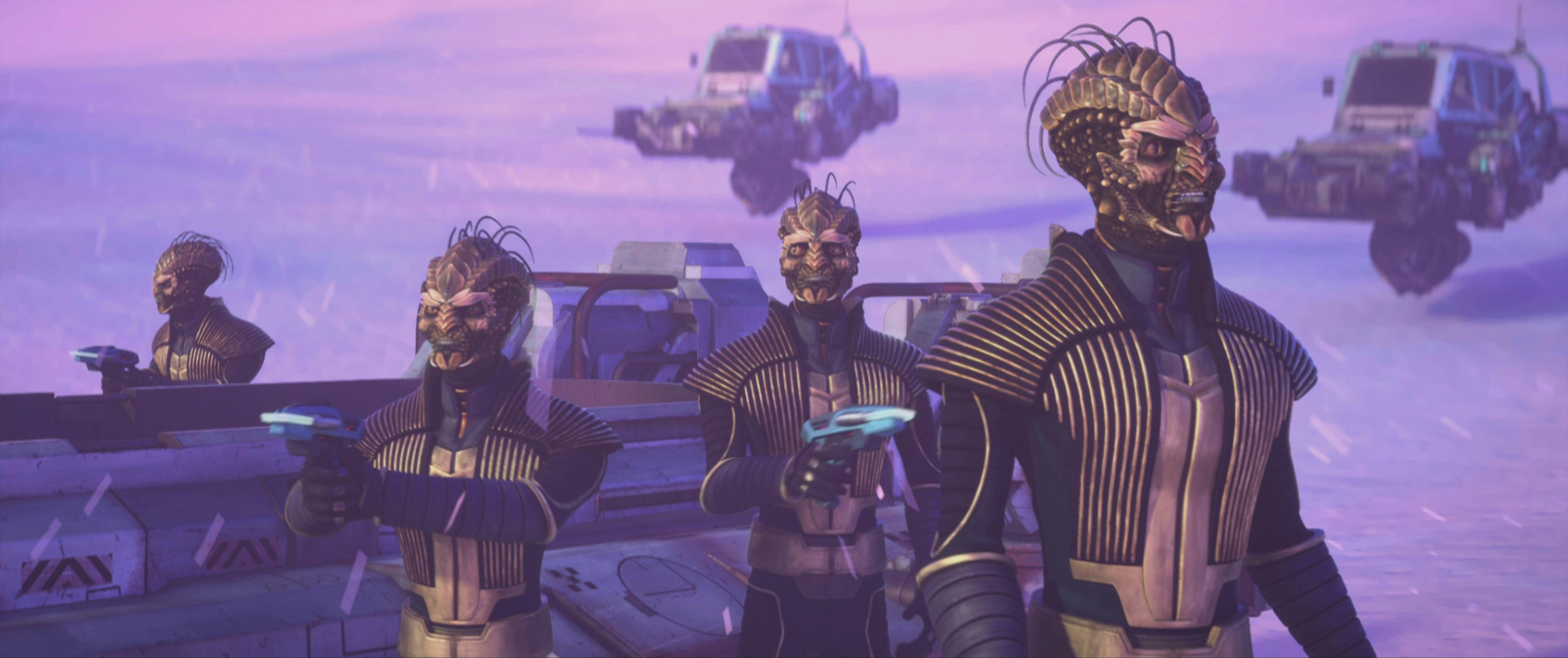 Xindi guards stand on a snowy planet.