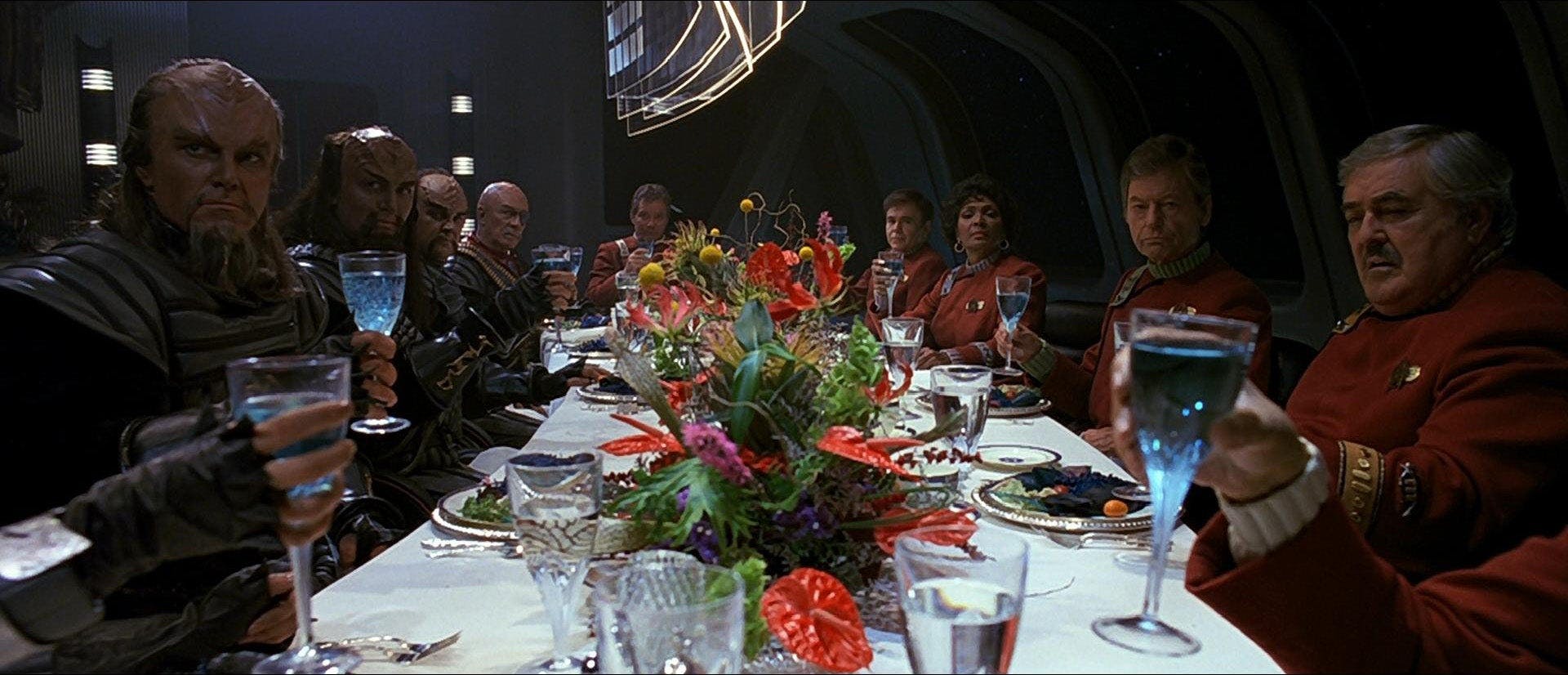 The Klingons and Federation meet over a meal with Gorkon at the head of the table in Star Trek VI: The Undiscovered Country