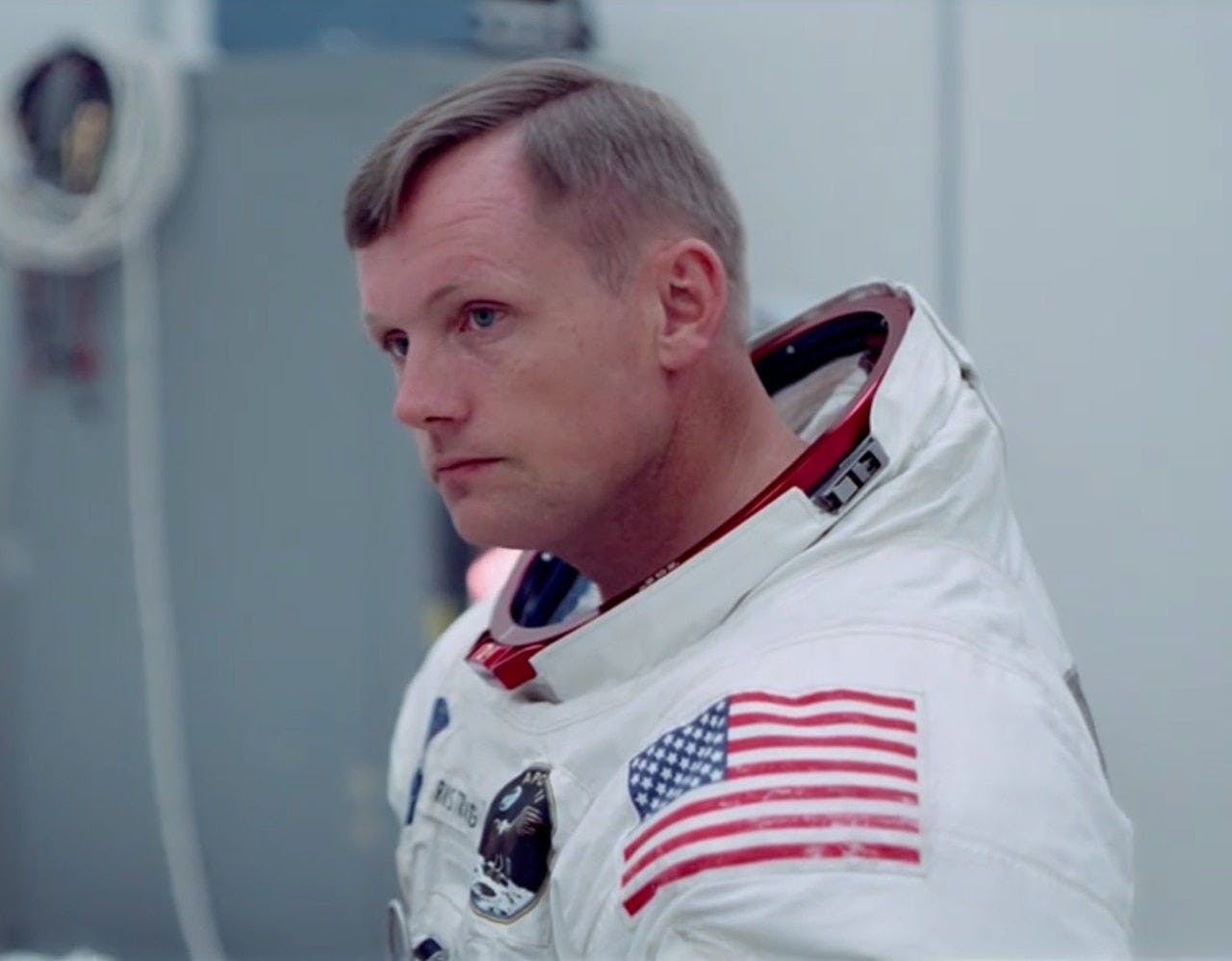 Before: On July 16, 1969, mission commander Neil Armstrong listens intently as Apollo 11 prepared to take off on an enormous Saturn V rocket for the Moon