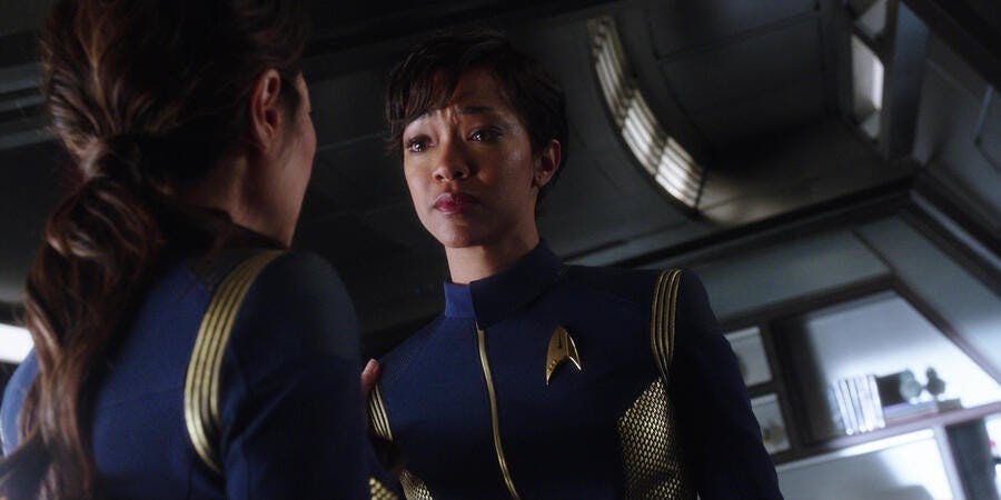A distressed Michael Burnham tears up as Georgiou puts her hand on her shoulder in 'The Vulcan Hello'