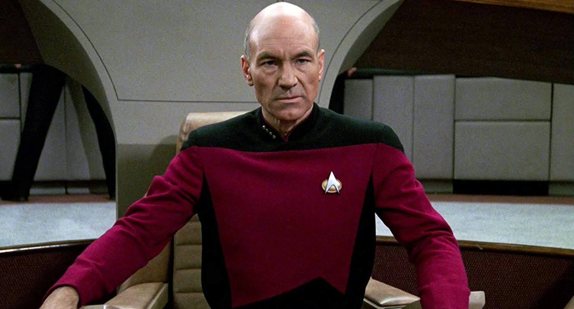 Picard sitting in the captain's chair