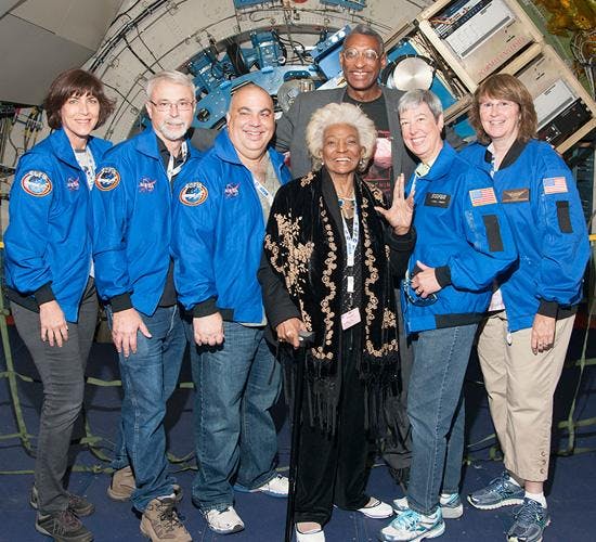 Actress Nichelle Nichols and Airborne Astronomy Ambassadors pose in front of the observatory telescope during their pre-flight safety training on Sept. 14. Front from left: Susan Oltman, Michael Shinabery, Jeffrey Killebrew, Nichelle Nichols, April Whitt and Jo Dodds. Back: Ivor Dawson.