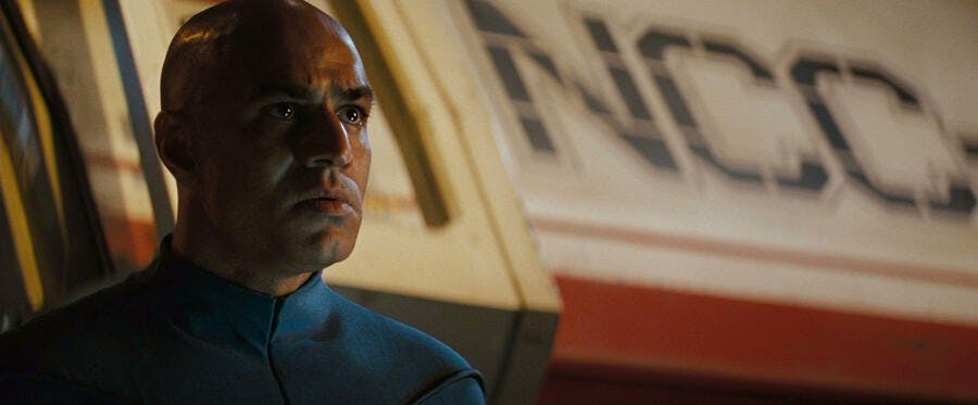 Captain Robau stands before his U.S.S. Kelvin shuttlecraft in Star Trek (2009)