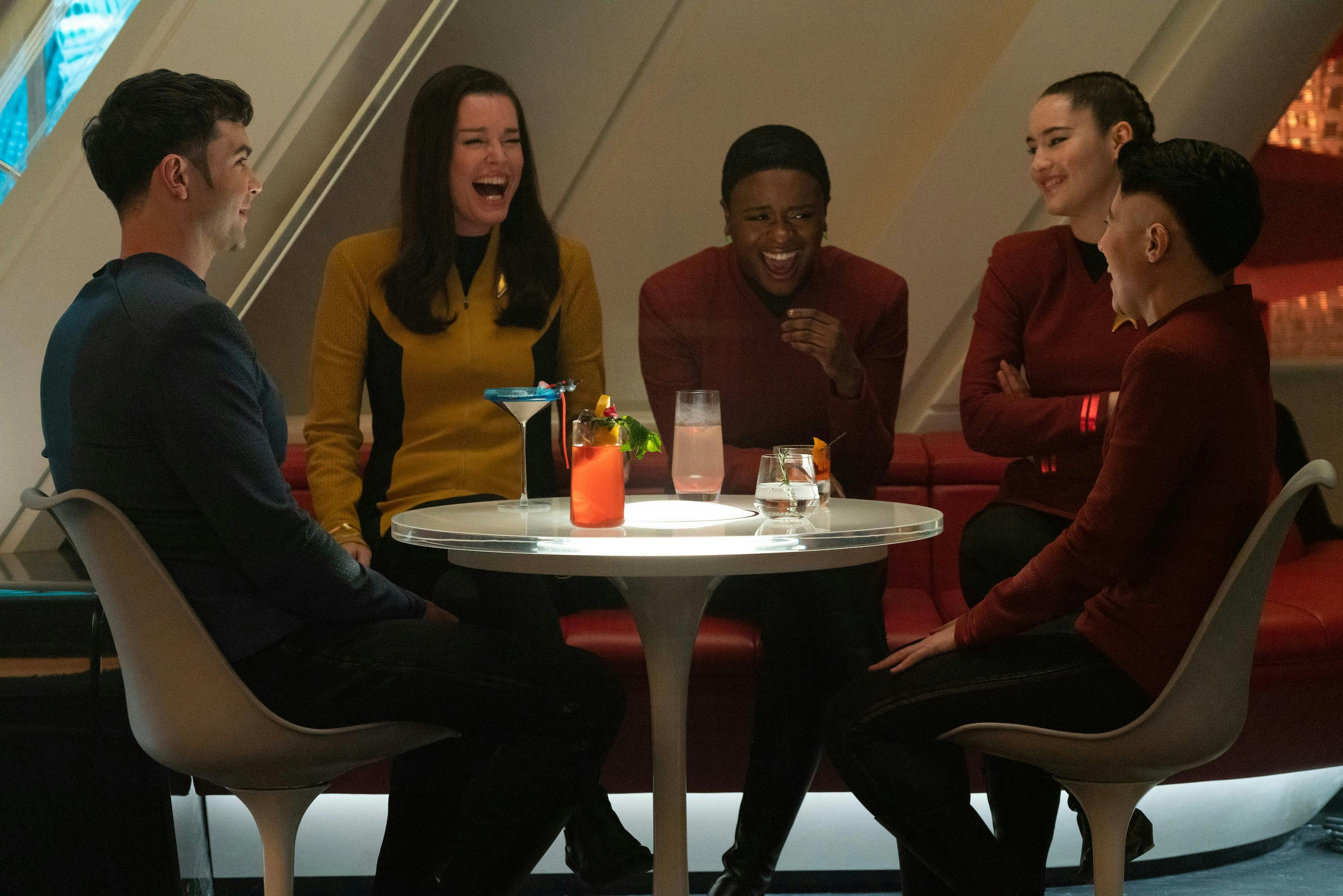 In the mess hall, Spock joins Number One/Una, Uhura, La'An, and Erica Ortegas as they laugh around a communal table in 'Charades'