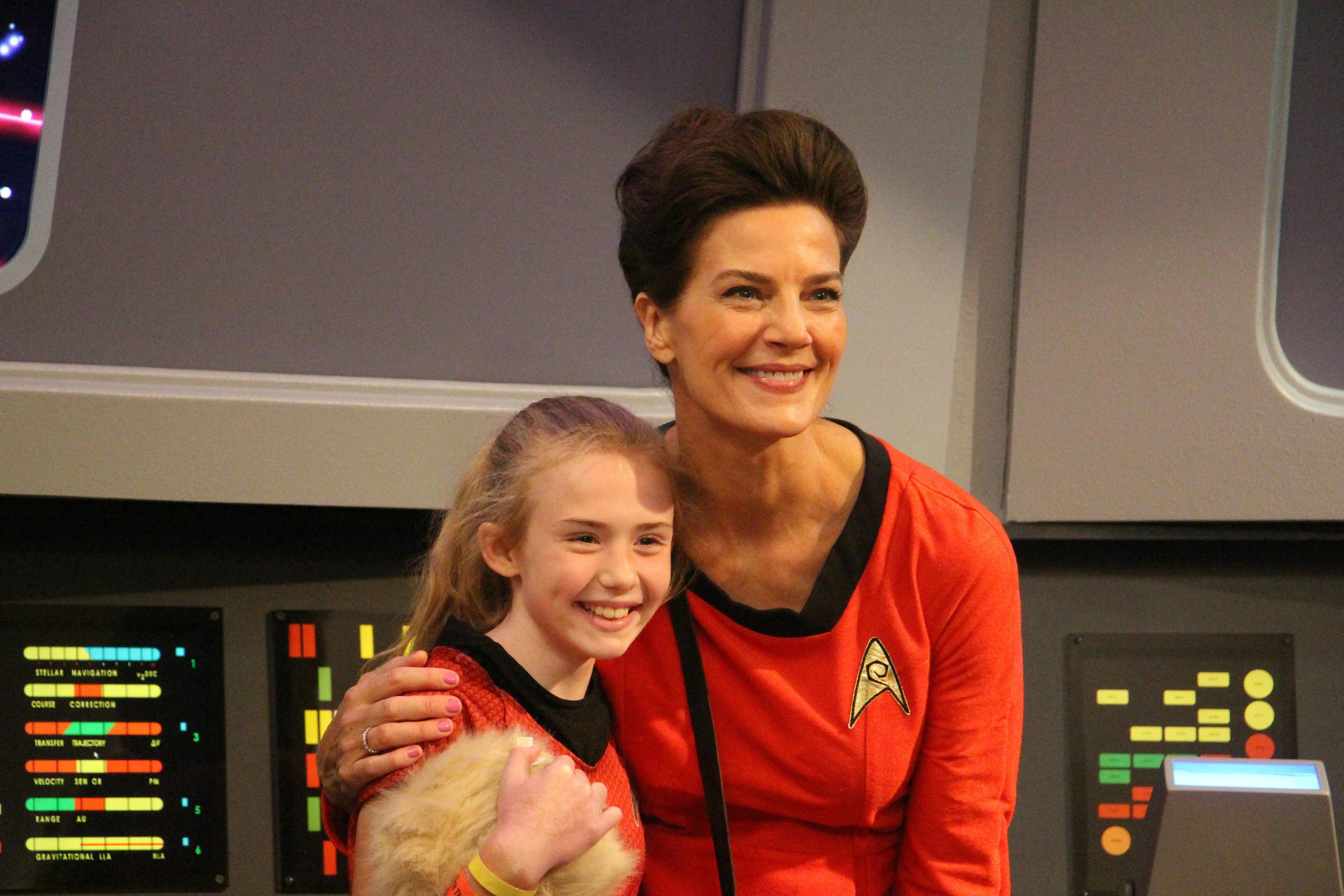 Terry Farrell greets a young fan 