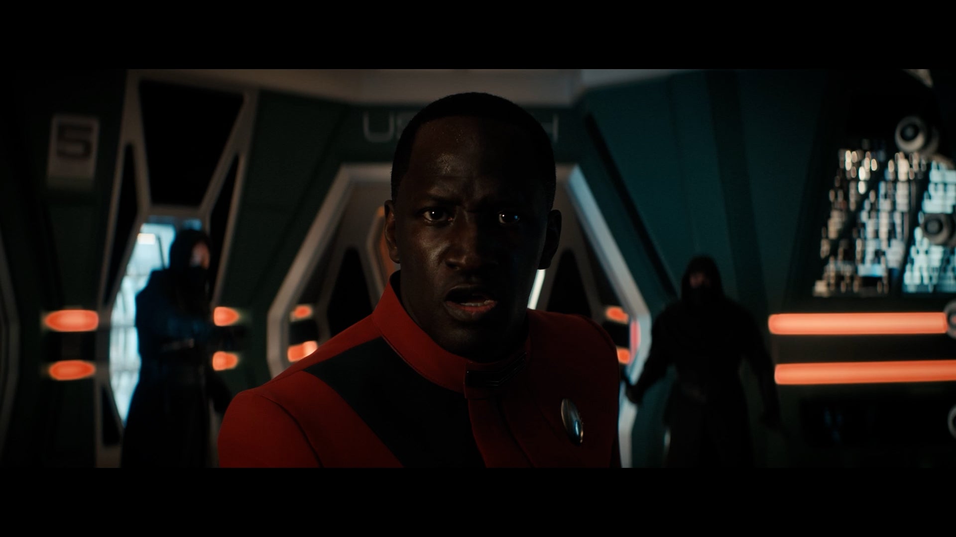 Commander Fickett stares down his opponent in this still from Star Trek: Discovery