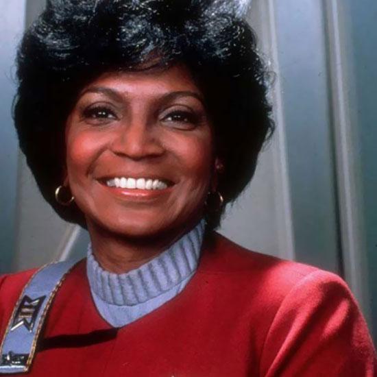 A smiling Uhura