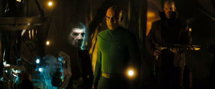 Robau on the Narada surrounded by Romulans and shown a hologram of Prime Spock