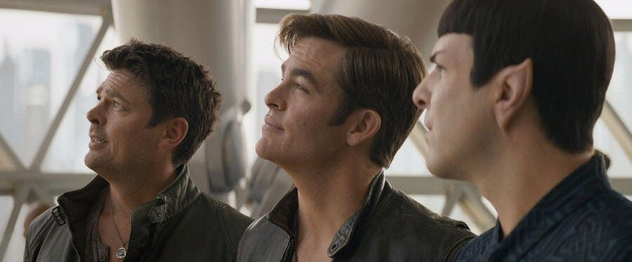 Leonard Bones McCoy, James T. Kirk, and Spock all look up at the Enterprise-A in the distance and wistfully yearn for another mission in Star Trek Beyond
