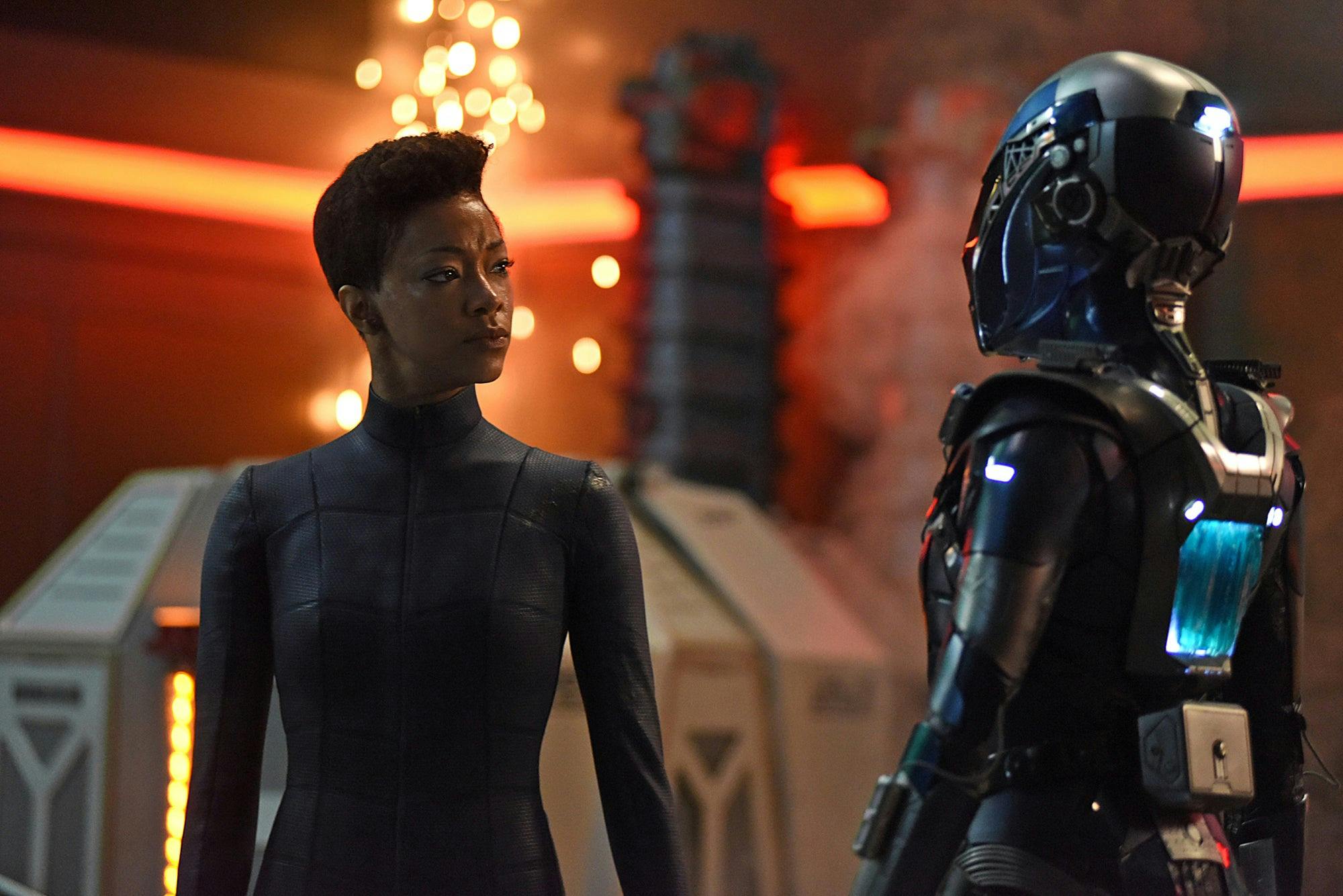 Michael Burnham looks over at the Red Angel suit stealing herself for the journey ahead of her in 'Such Sweet Sorrow, Part 2'