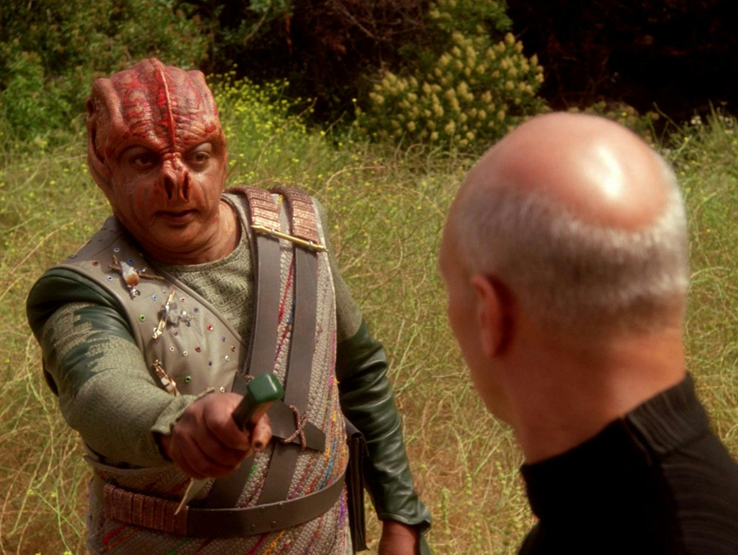 On the surface of El-Adrel IV, Captain Dathon hands his dagger-like weapon to Picard in 'Darmok'