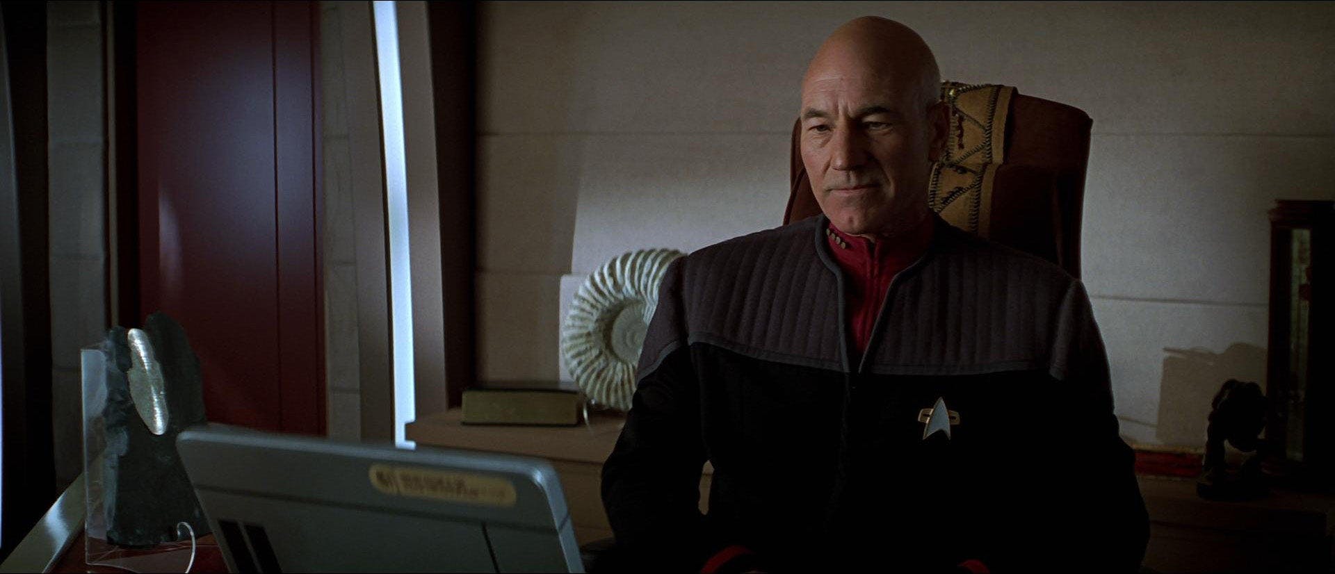 Picard listens to Berlioz before preparing for battle in Star Trek: First Contact