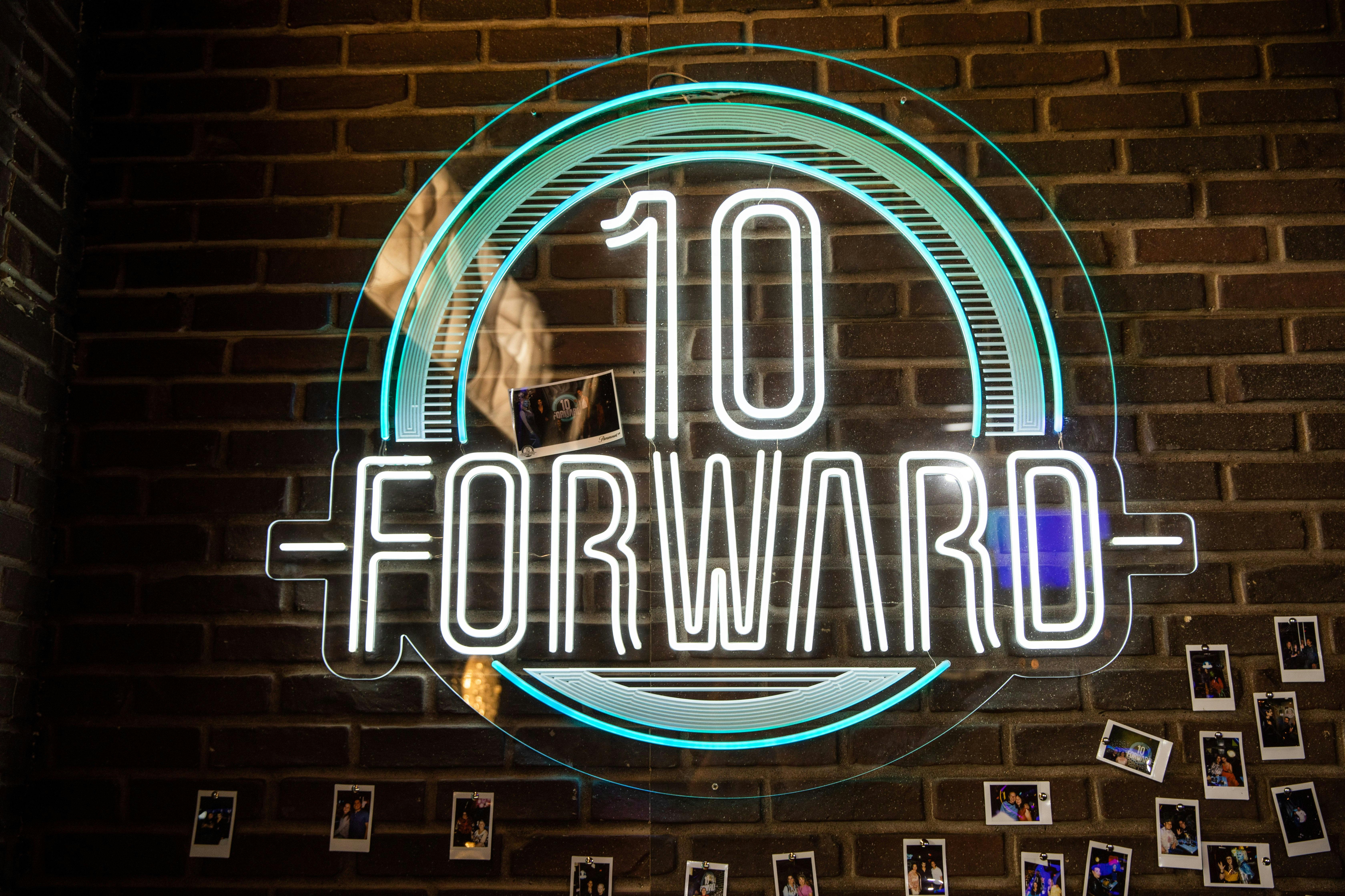 The 10-Forward sign in the bar.