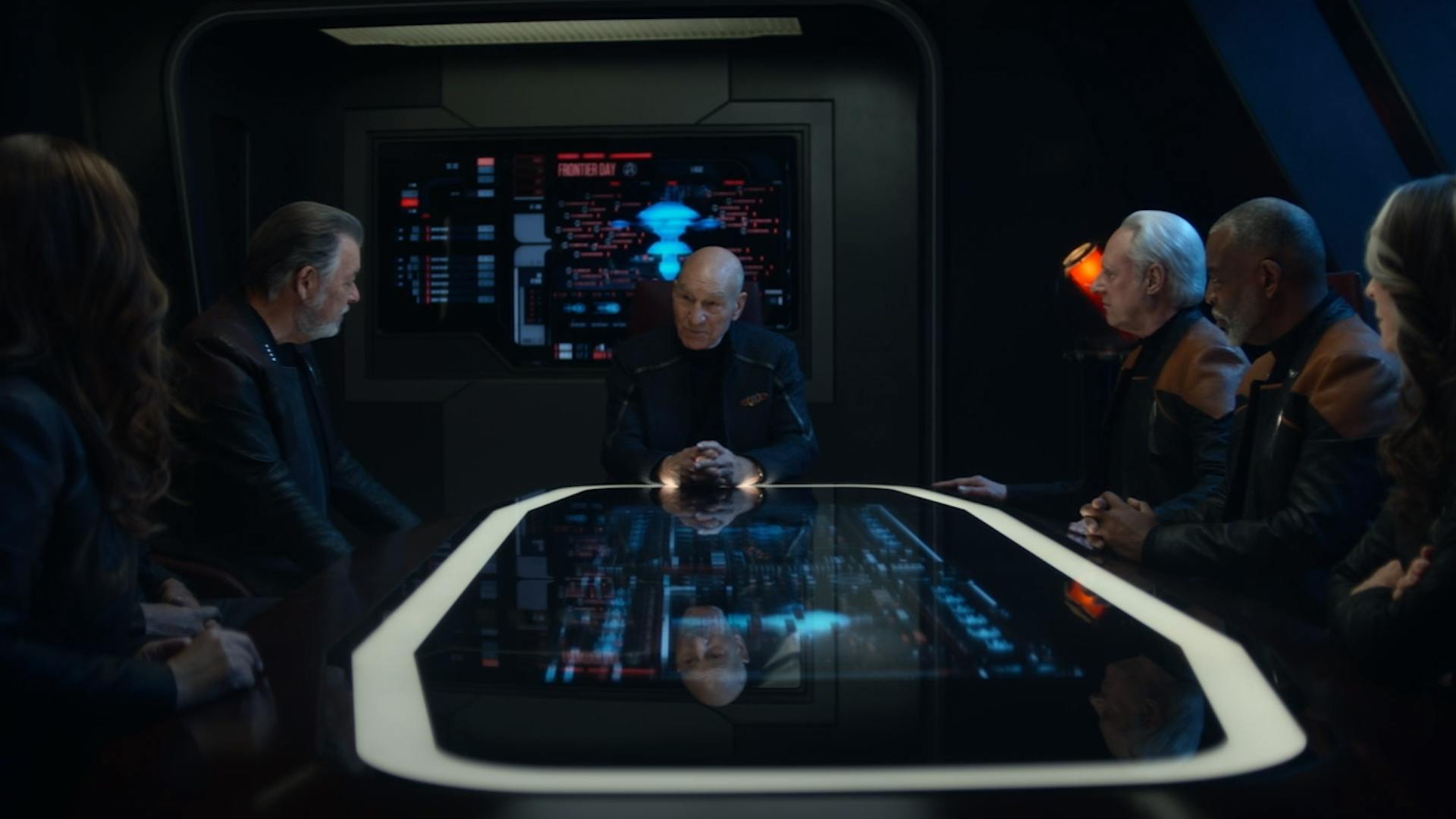 Picard's old crew (Worf, Riker, Geordi, Data, Deanna Troi, Beverly Crusher) all reunited and sitting around the table on the Titan