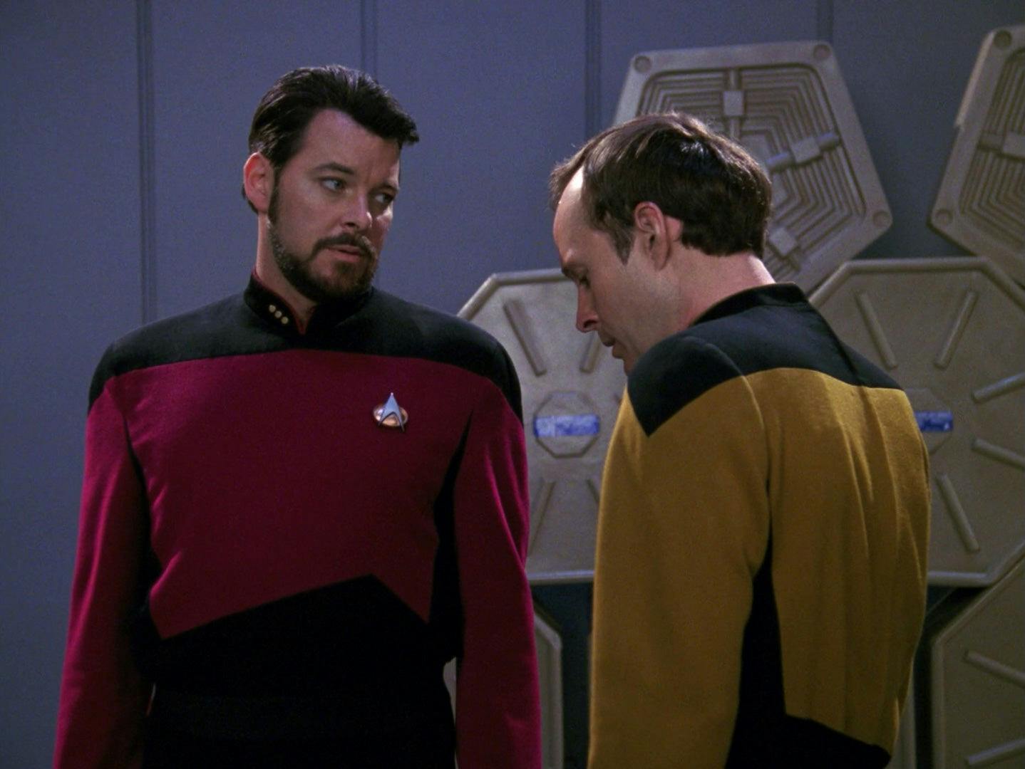 Riker looks down at a Barclay who looks down and can't meet his eye in 'Hollow Pursuits'