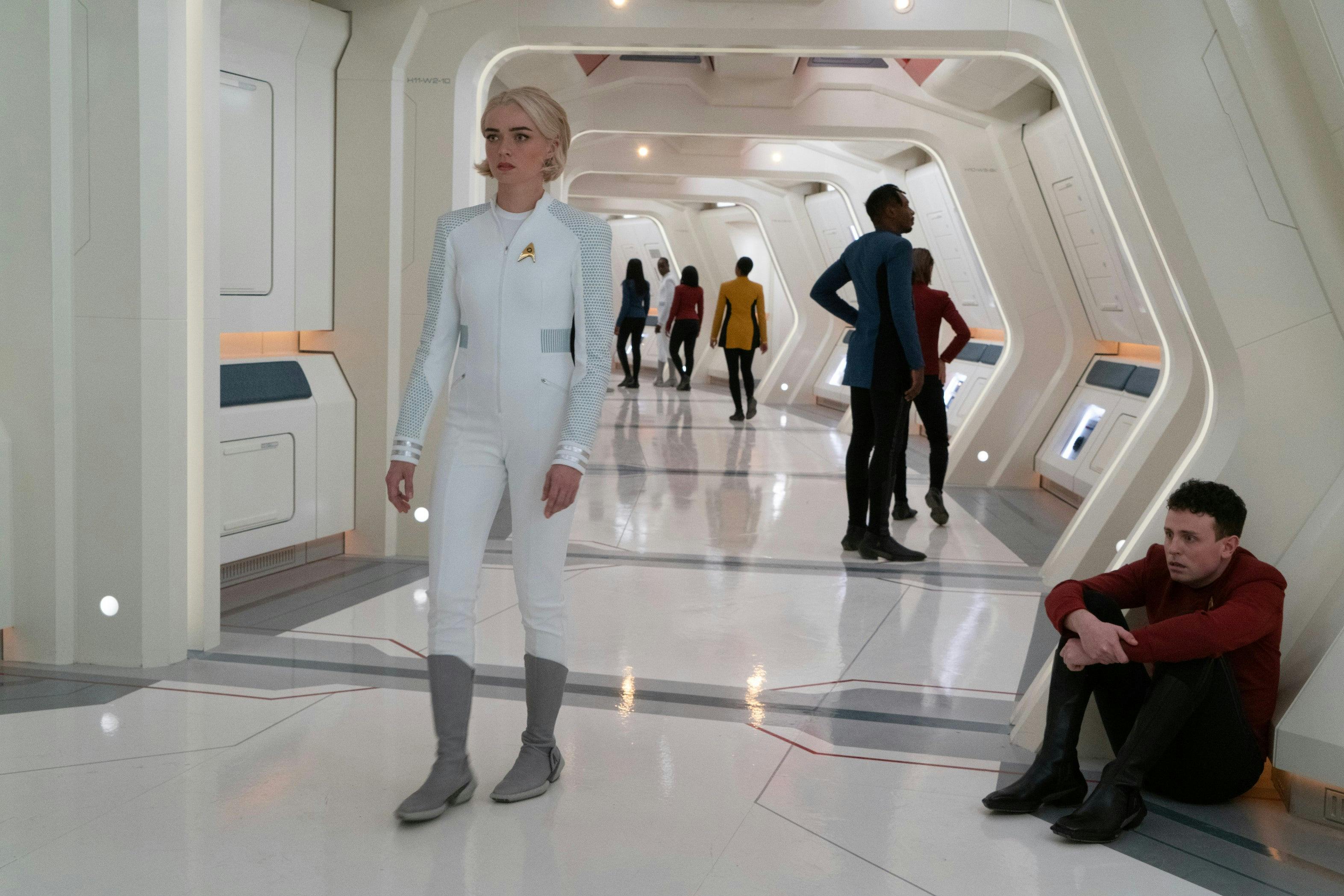 The Enterprise crew including Nurse Christine Chapel wander the Enterprise corridor in 'Among the Lotus Eaters'