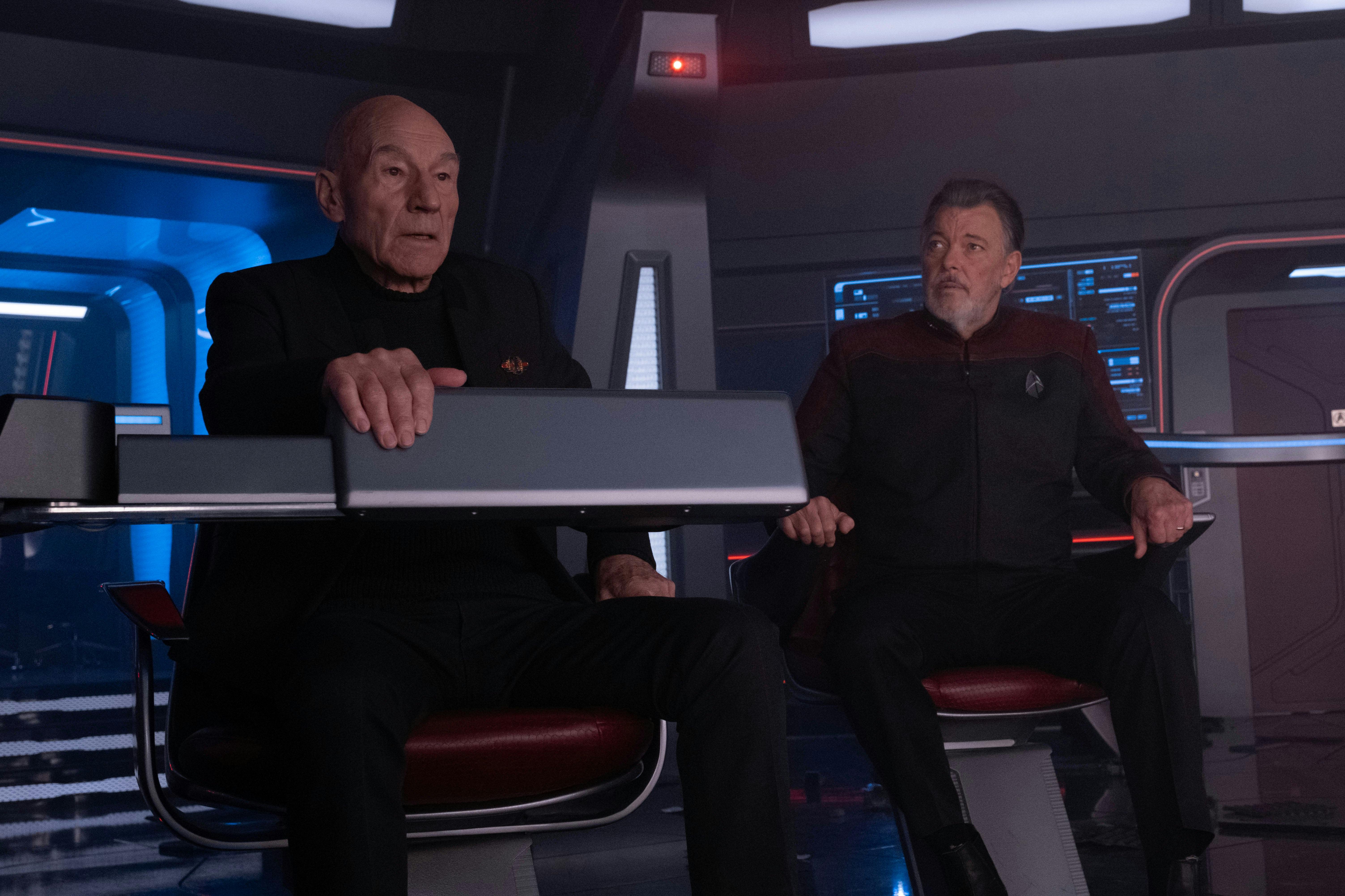 Picard and Riker sit on the bridge of the Titan and assess the situation 