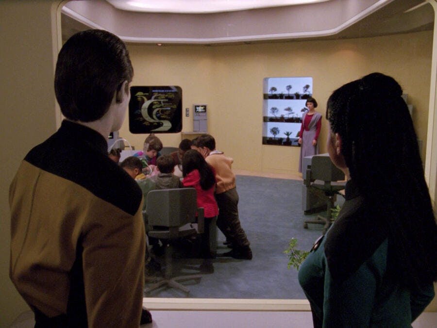 Data observes, along with the school teacher, Lal not interacting and standing afar from her classmates in 'The Offspring'