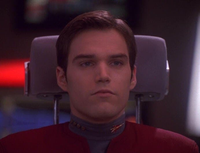 Close-up of Tim Watters in the captain's chair in 'Valiant'