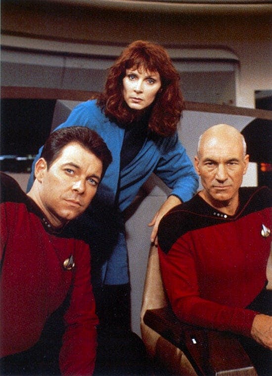 Will Riker, Beverly Crusher, and Jean-Luc Picard