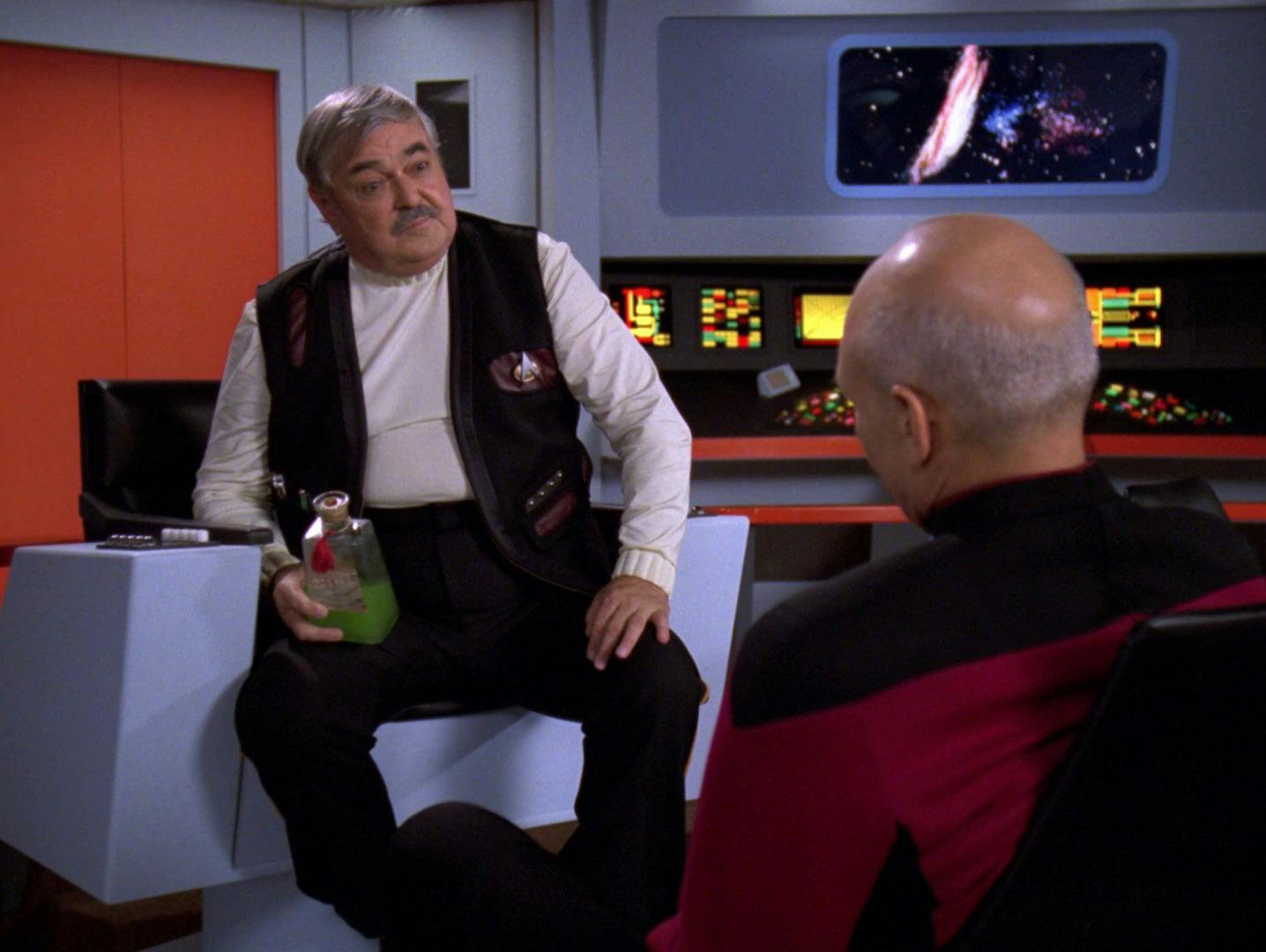 Scotty and Picard sit on the original Enterprise NCC-1701 on the holodeck in 'Relics'