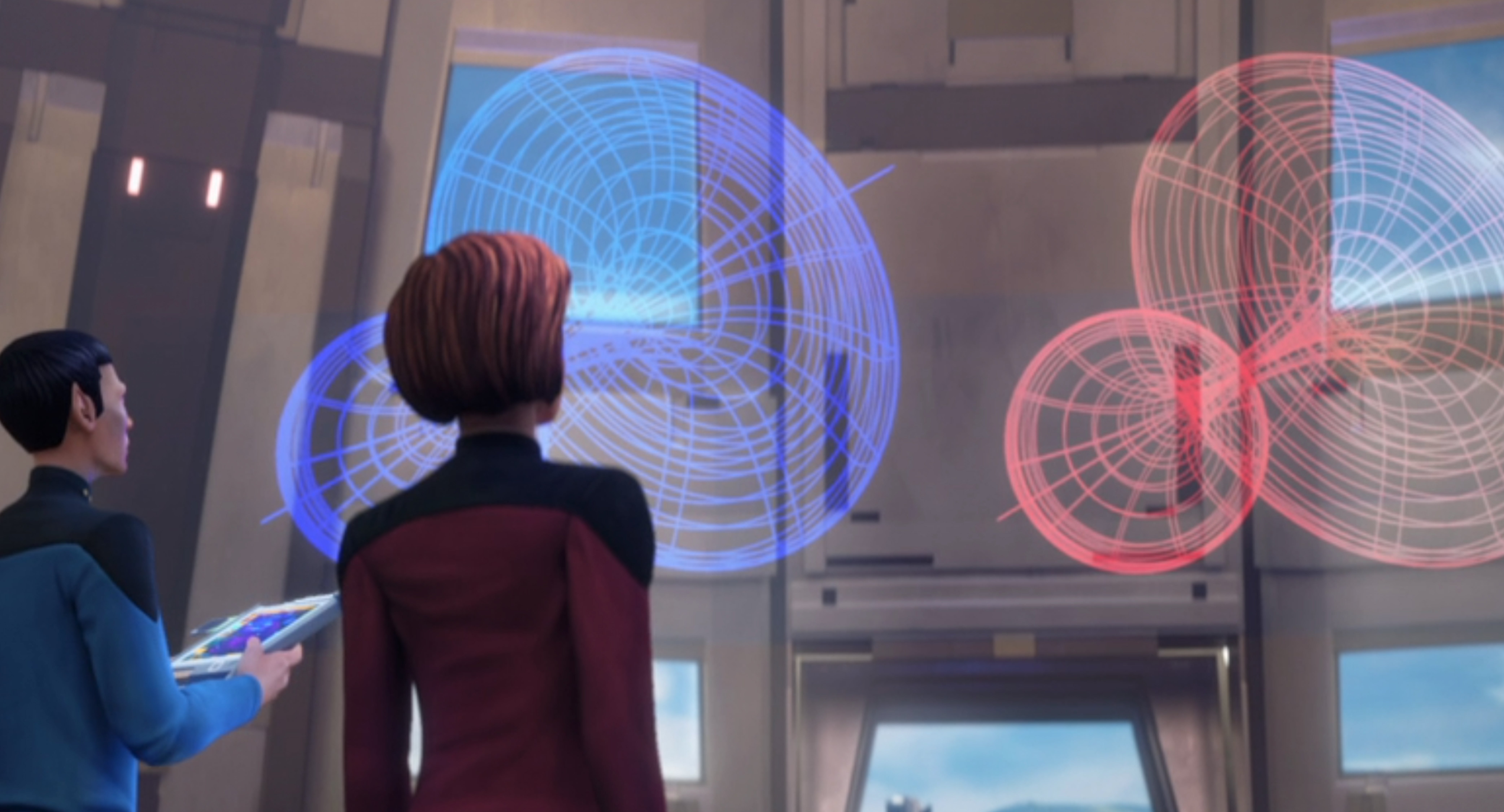 A Vulcan Starfleet officer and Vice Admiral Janeway analyze space signals sent from the future on Star Trek: Prodigy