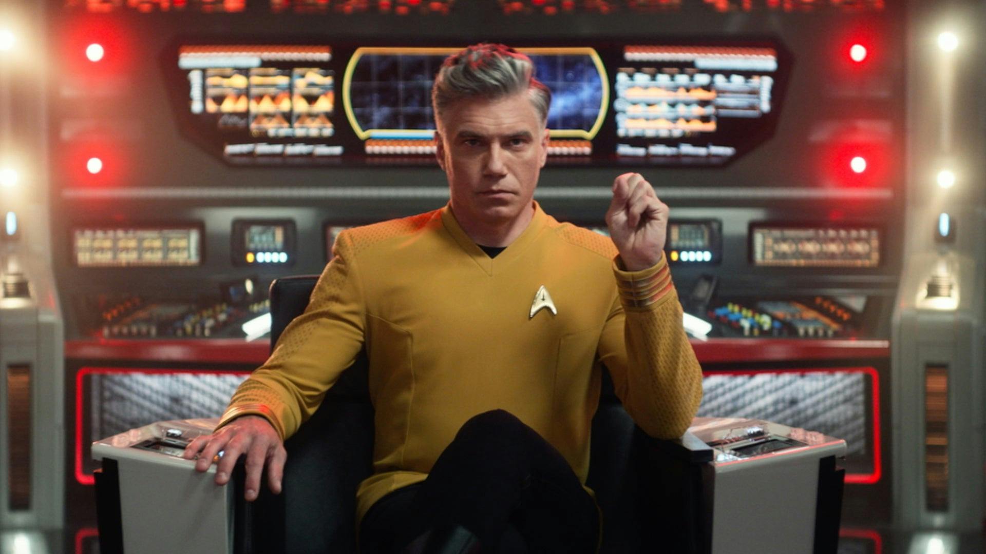 Captain Pike (Anson Mount) sits ready for action on the bridge of the Enterprise.