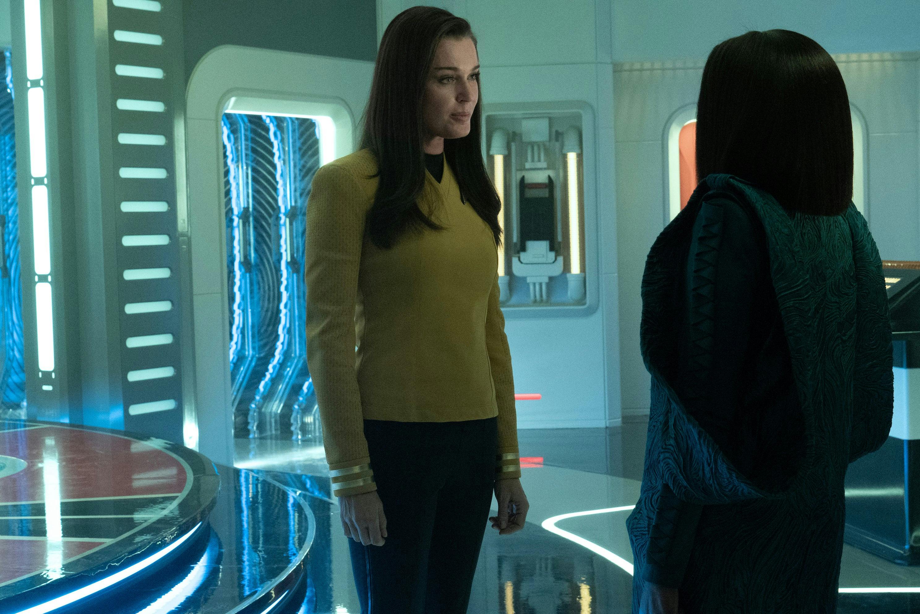 In the transporter room, Una Chin-Riley stands face to face with Neera in 'Ad Astra per Aspera'