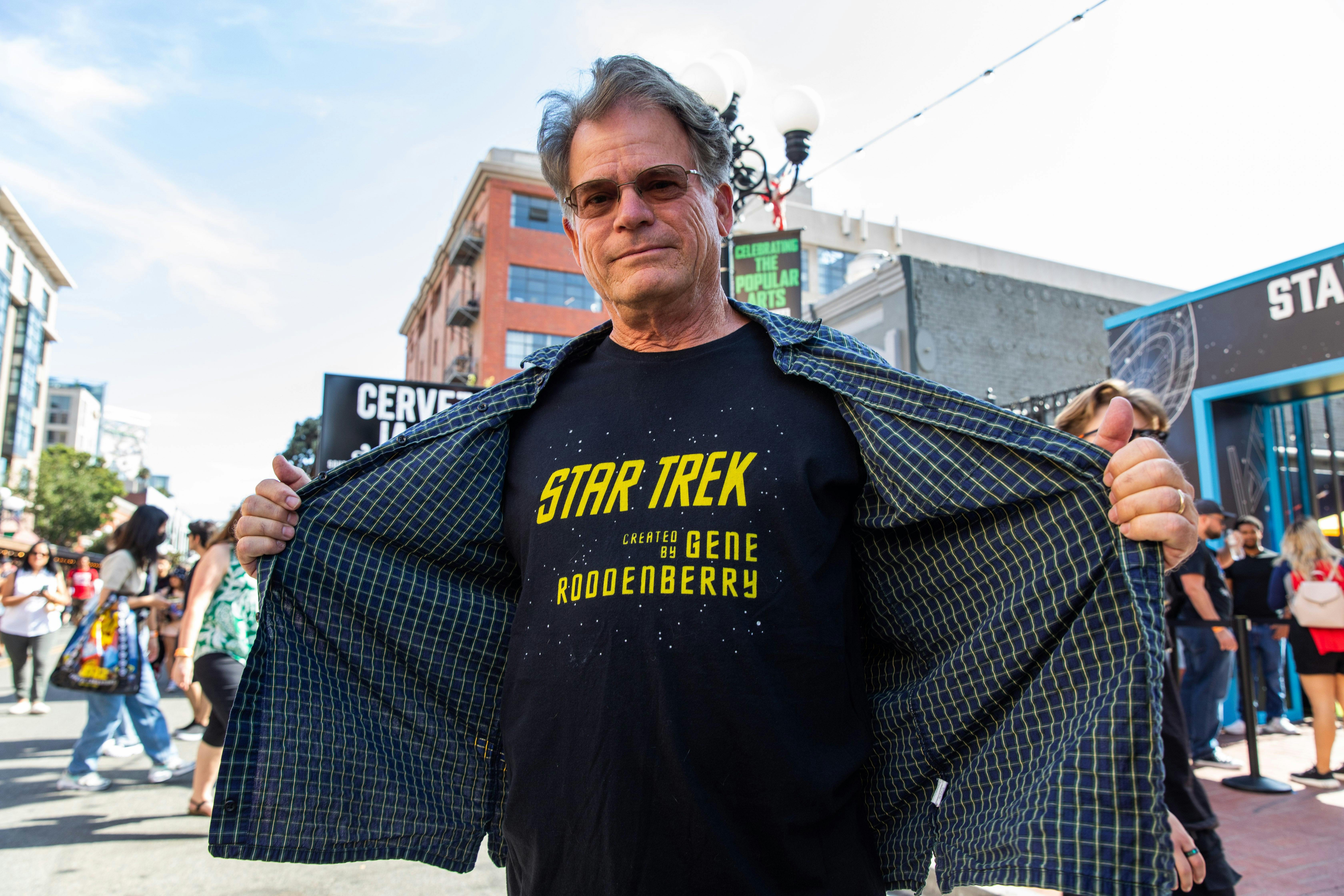 A fan shows off his Star Trek shirt.