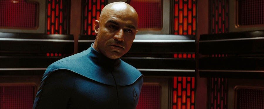 Captain Robau stands in the turbolift in Star Trek (2009)