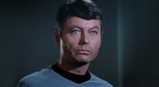 DeForest Kelley as Dr. Leonard “Bones