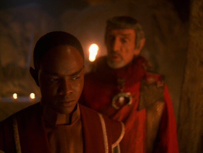 A young Tuvok glances over his shoulder towards the Vulcan Master in 'Gravity'