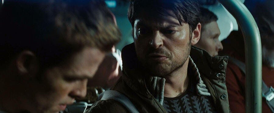 Strapped into a shuttle, Dr. Leonard McCoy gruffly warns his seat mate James T. Kirk in Star Trek (2009)