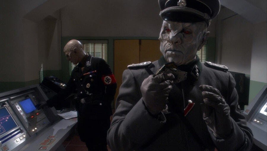 Ghrath wears the uniform of an SS Obersturmführer in a base on Earth in 'Storm Front'