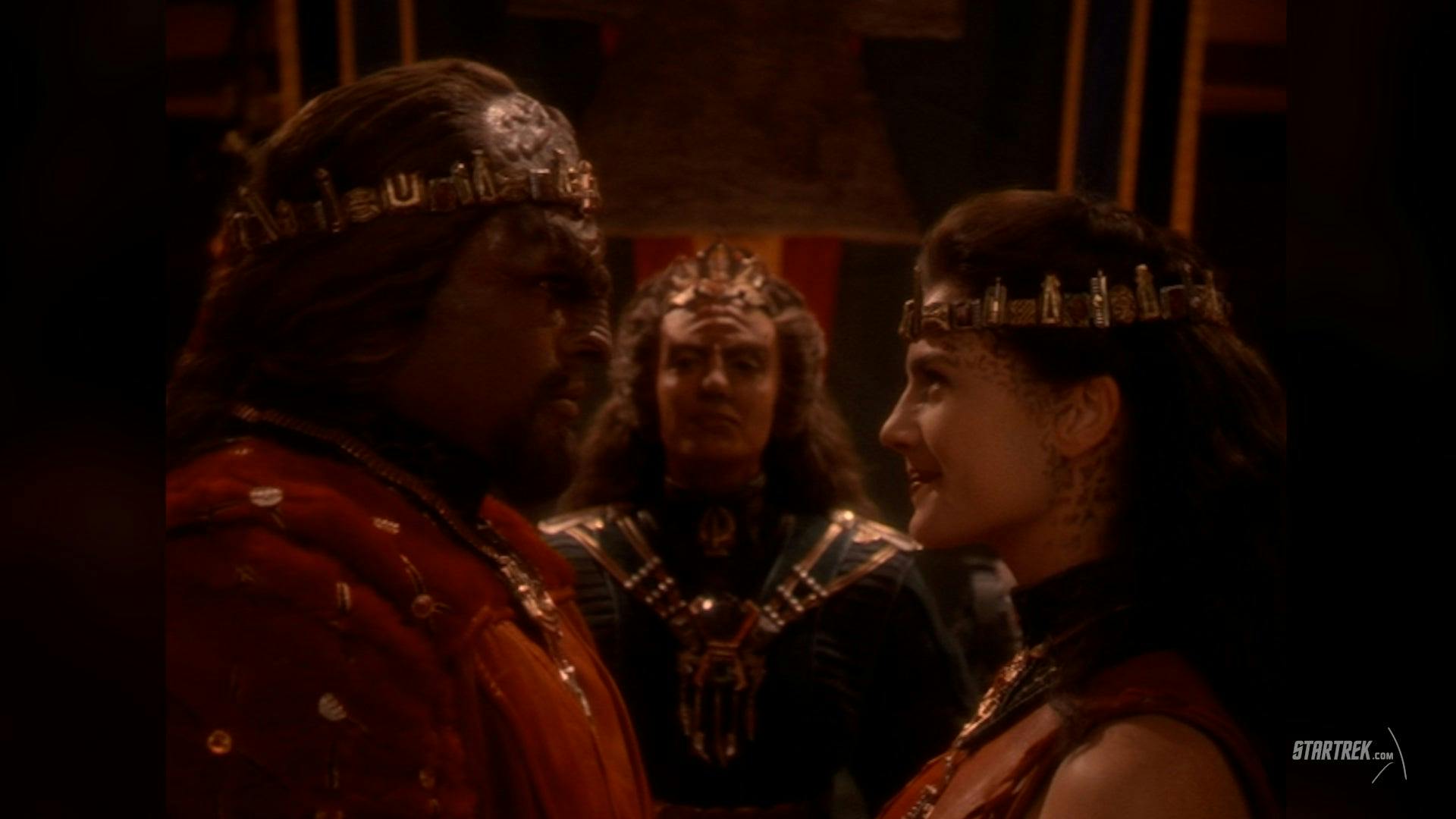 Worf and Jadzia Dax stand, ready to be married, in this still from Star Trek: Deep Space Nine (