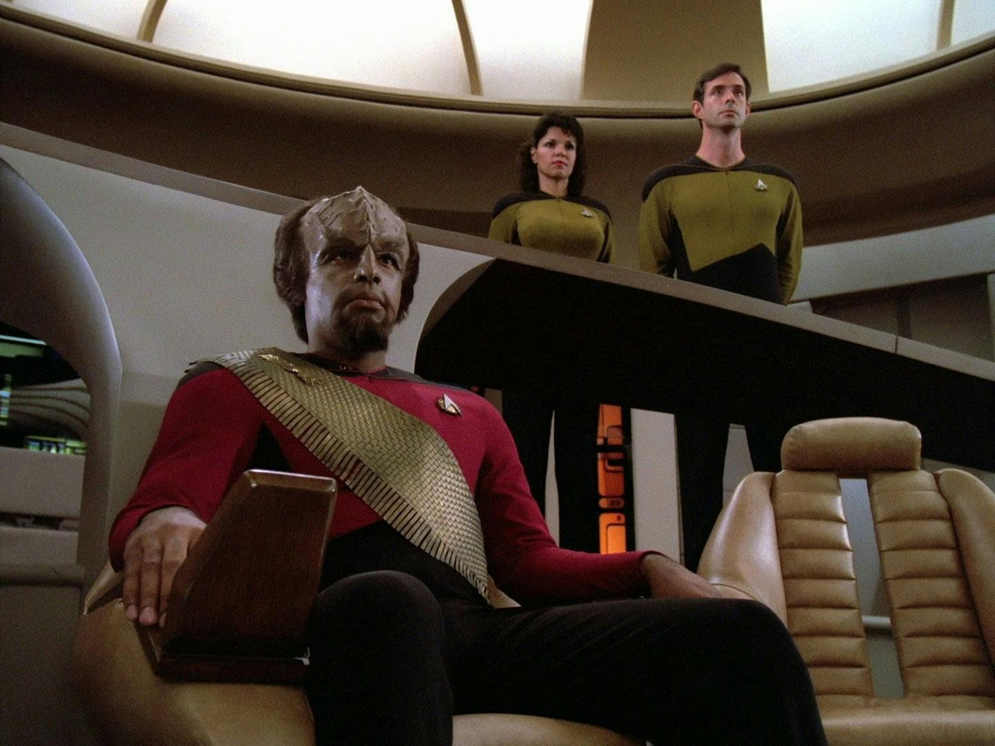 Worf sits in the center seat in command in 'Encounter at Farpoint'
