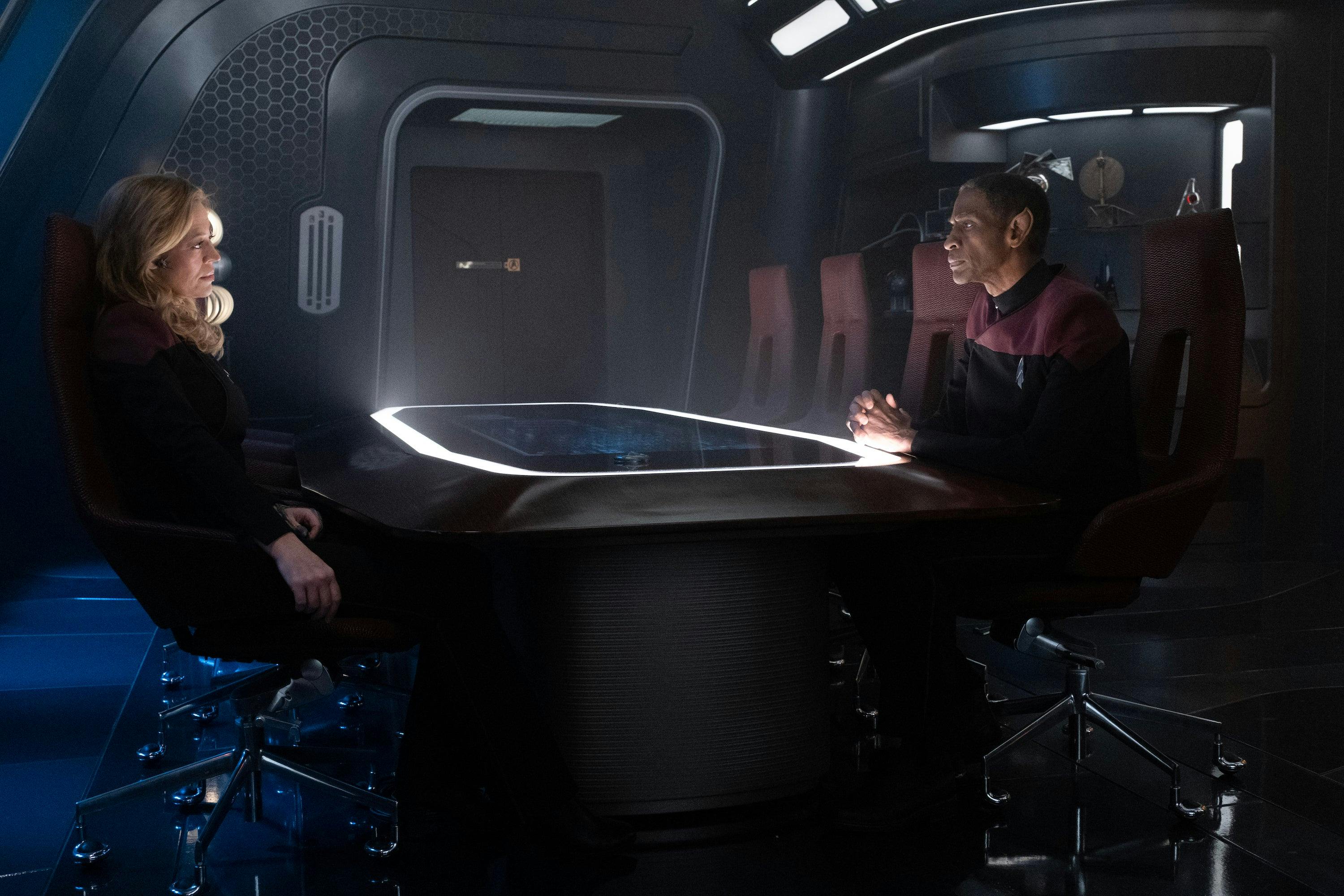 Commander Seven sits cross Tuvok in the Observation Lounge in 'The Last Generation'