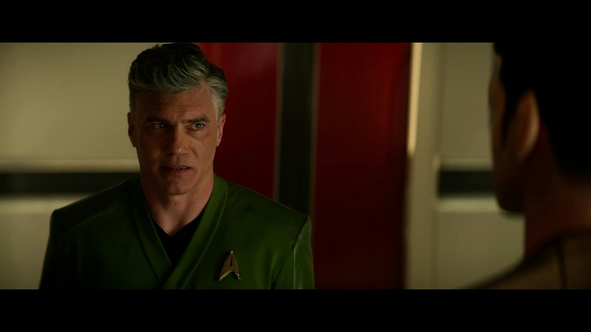 Anson Mount as Captain Pike talking to Ethan Peck as Spock