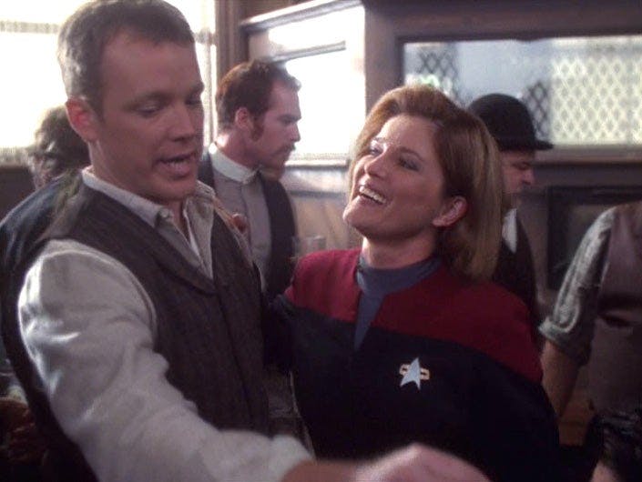 Captain Janeway enters Tom Paris' holo-program 'Fair Haven' and assesses Tom's programming