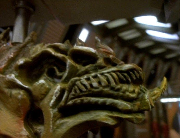 Skeletal Cardassian fish display on the promenade on Deep Space 9 in 'The Nagus'