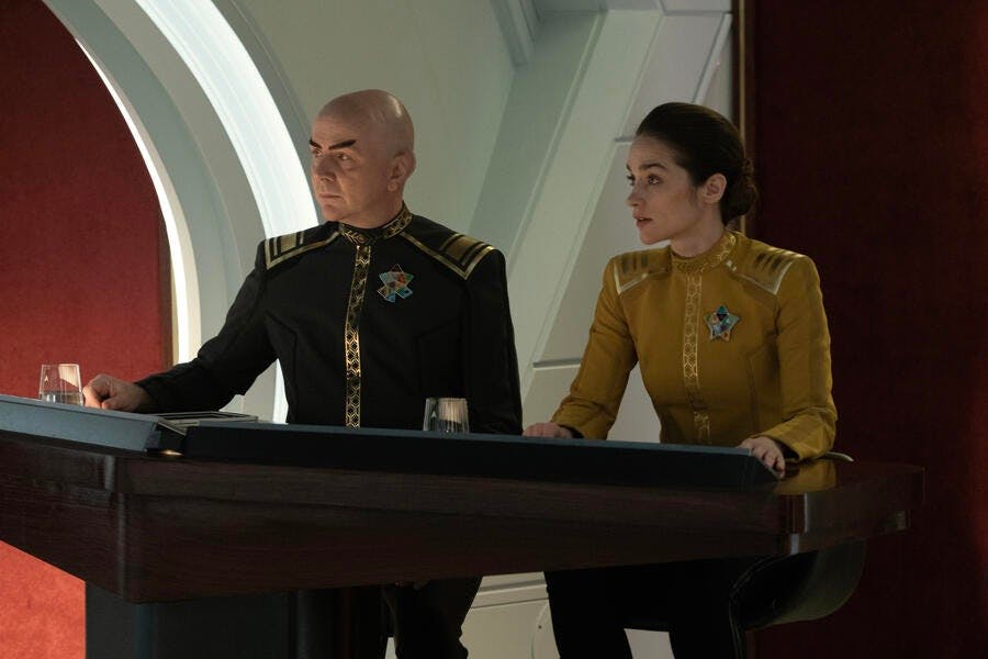 Vice Admiral Pasalk and Captain Batel stand at the prosecution desk in 'Ad Astra per Aspera'