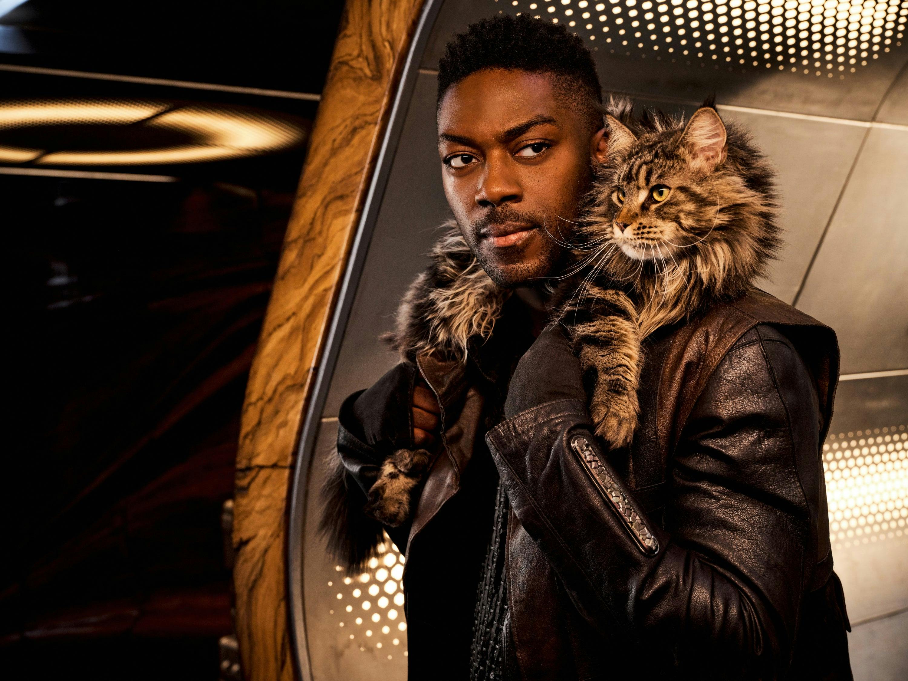 Promotional still of David Ajala as Star Trek: Discovery's Cleveland 'Book' Booker with Grudge resting on his shoulders