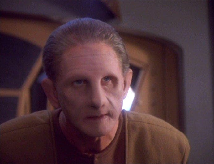 Odo in the Commander's office debating the merits of law and justice on Star Trek: Deep Space Nine