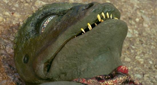 Close-up shot of the bloodied and defeated Gorn in Star Trek: The Original Series' Arena