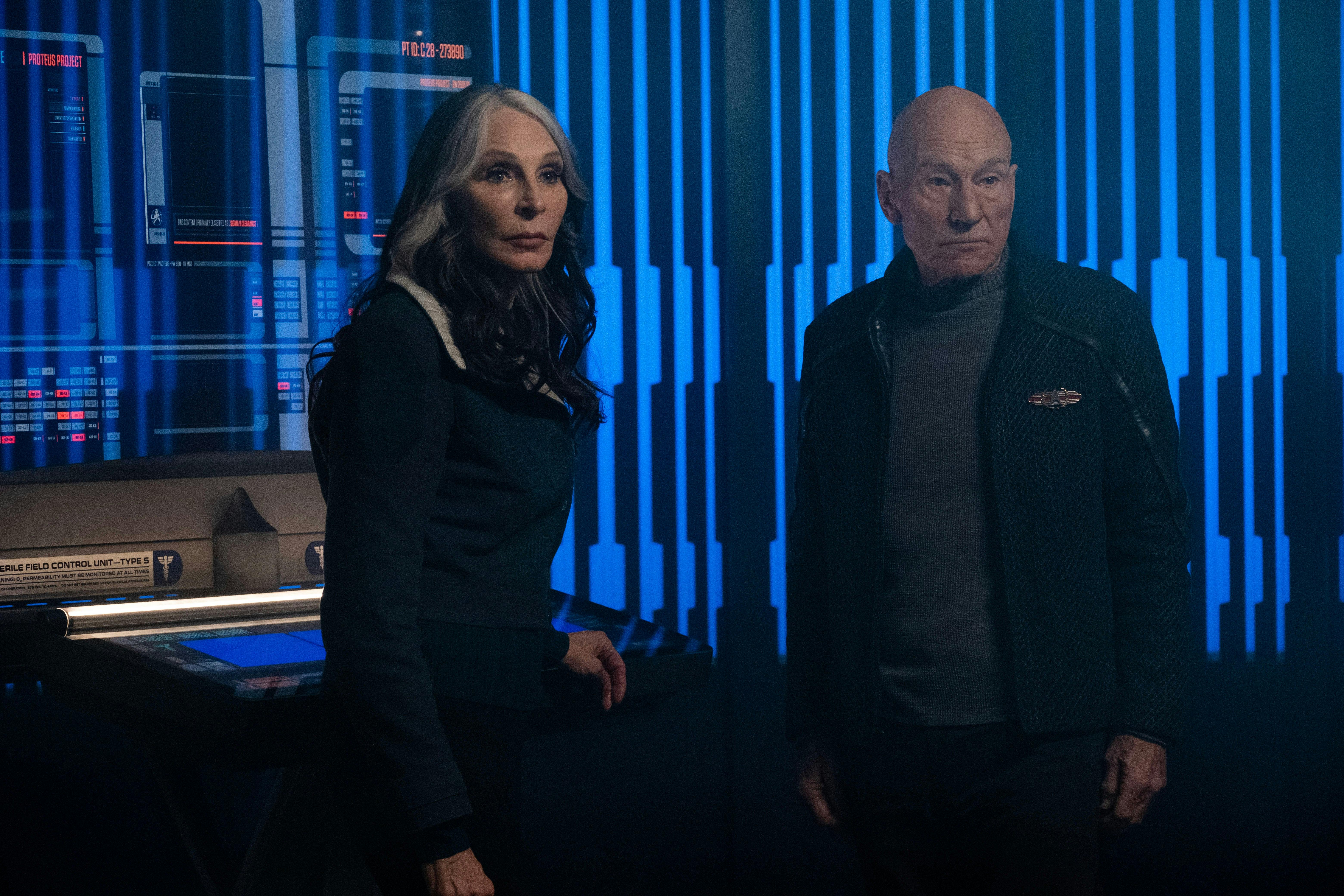 In the Titan's Sickbay, Dr. Beverly Crusher and Picard pause and look ahead of them
